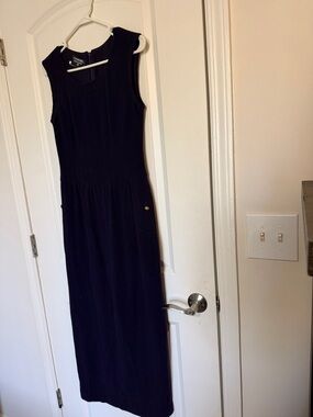 CHANEL Sleeveless Black Maxi Dress with Gold Button Detail